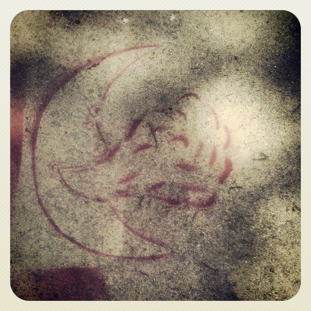 Moon smoking, found on a sidewalk. #moon #sidewalk #stencil #weird