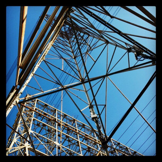 Looking up through a transmission #tower. #powerlines #sky #scaffold