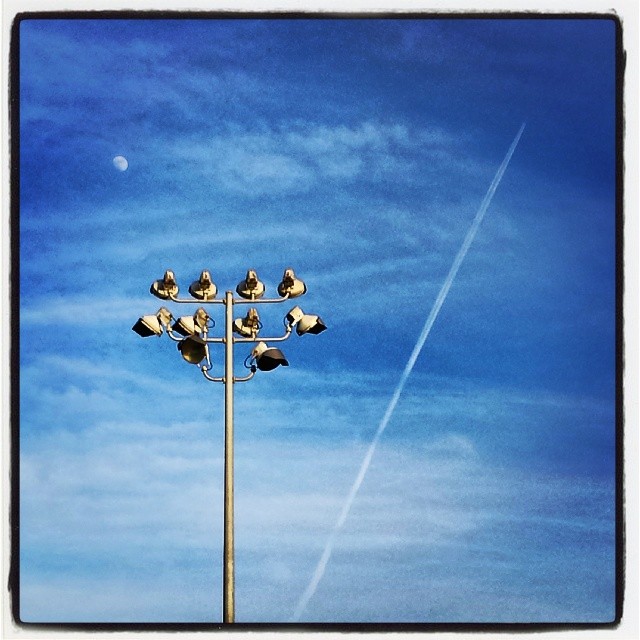 Moon and contrail with more contrast.