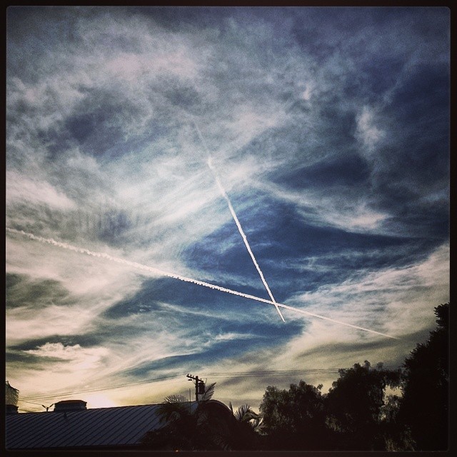 Sunset clouds and #contrail X