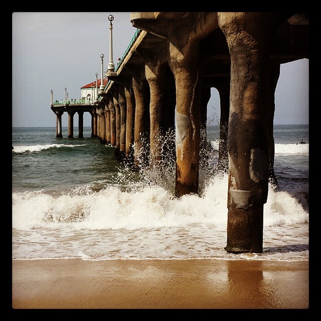 Waves striking the pier.