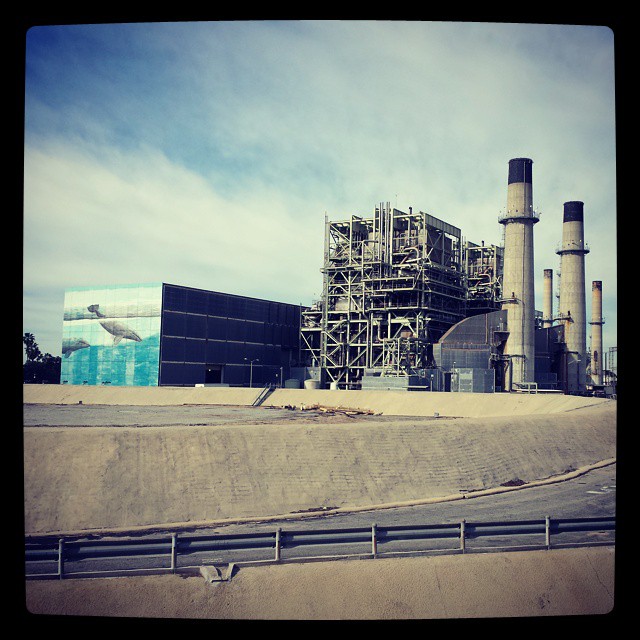 Contrast: #powerplant with a #Wyland #whale #mural. This plant in #RedondoBeach #California is set to be decommissioned when new environmental protections go into effect, and the city and plant owner have been debating the future of the site. #smokestacks #industrial #art #whales