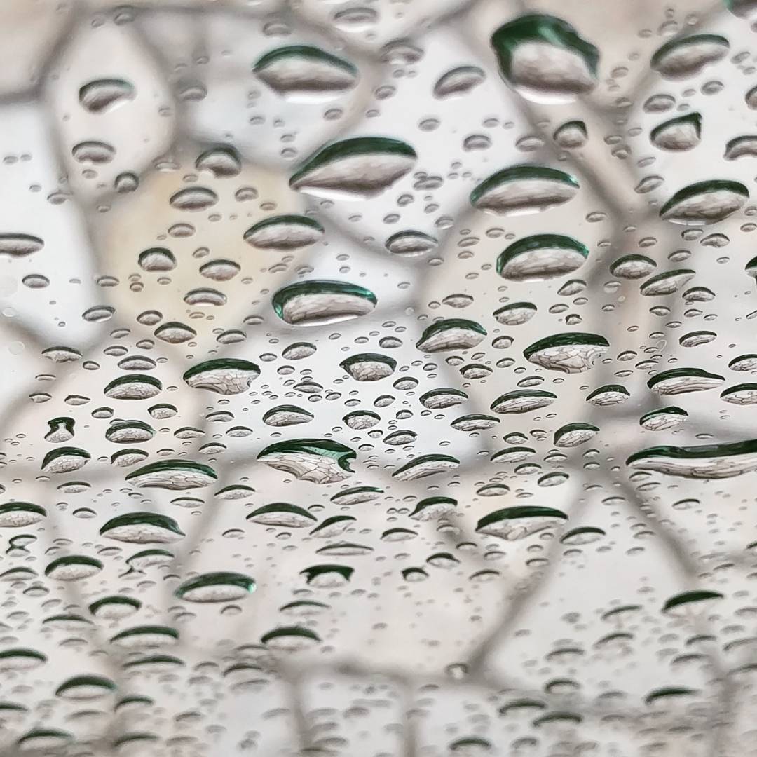 Raindrops, glass and stone.

#raindrops