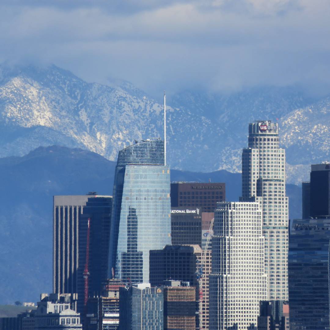 Snow-dusted mountains behind the Los Angeles skyline. Closest we’ll get to a white Christmas, but the day certainly fit the song’s intro! #losangeles #skyline #snow #mountains