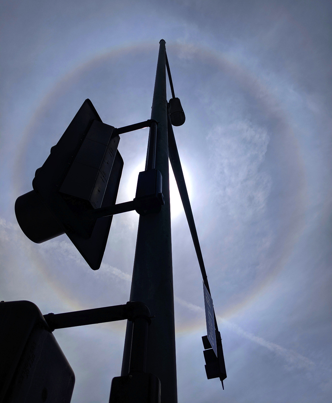 Two views of a 22-degree circular #halo around the sun that I saw on a ...