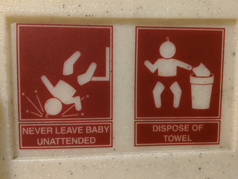 Found this on a restroom changing table. That's...one really coordinated baby.



