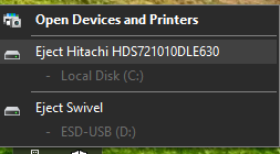 Pop-up menu for open devices and printers offering to let me eject a USB thumb drive on D:.... or the system disk on drive C.